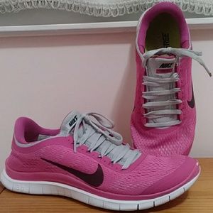 Dark pink/white women's Nike Free Run 3.0 size 8
